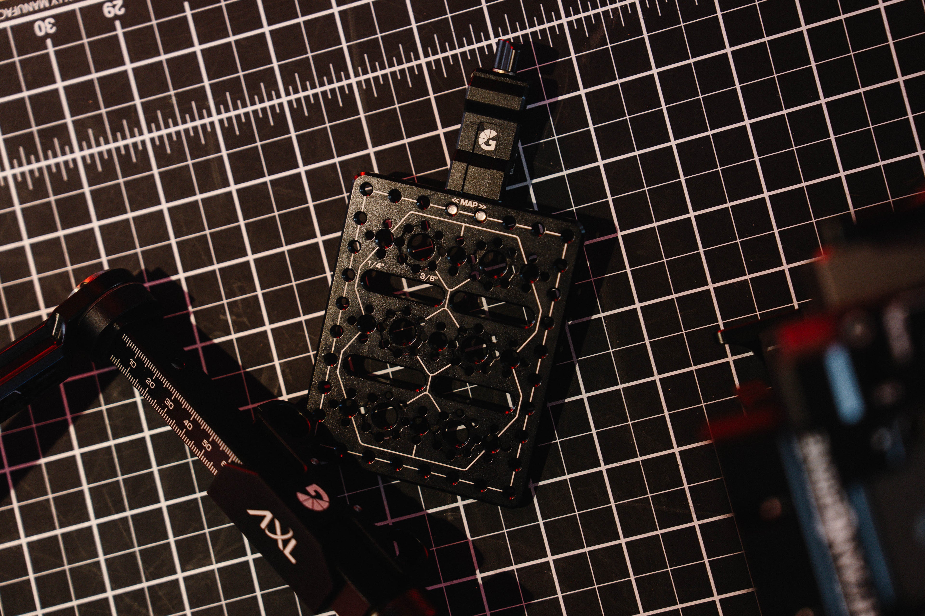 Image of a NATO Cheese Plate on a black work surface.